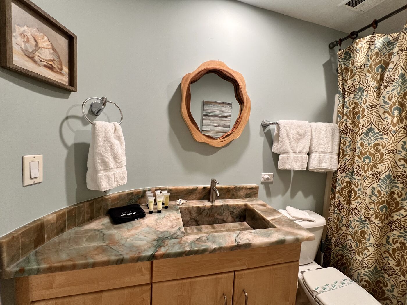 Powder room vanity in veined marble