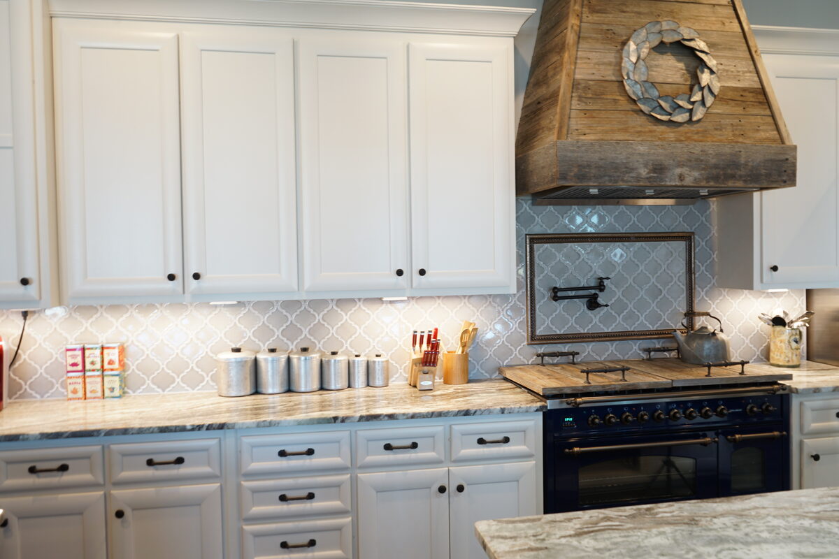Custom kitchen with a wood hood