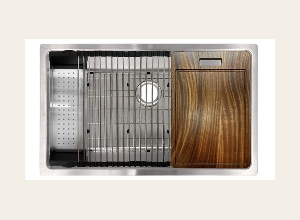 Workstation sink with ledge, grid, colander and cutting board